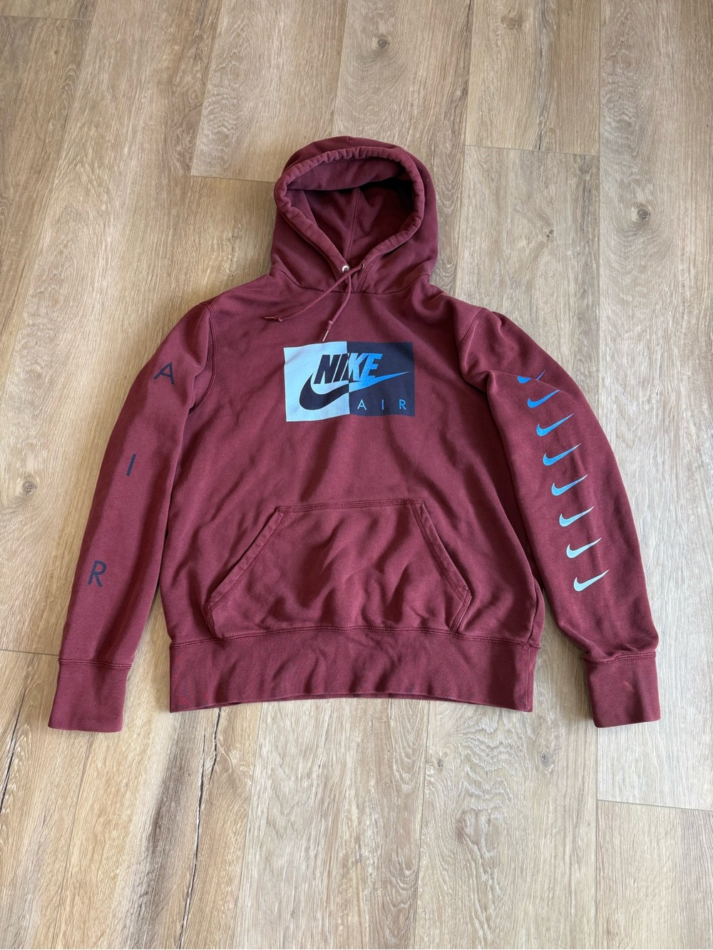 Nike Maroon Pullover Hoodie with Blue Swoosh Accents